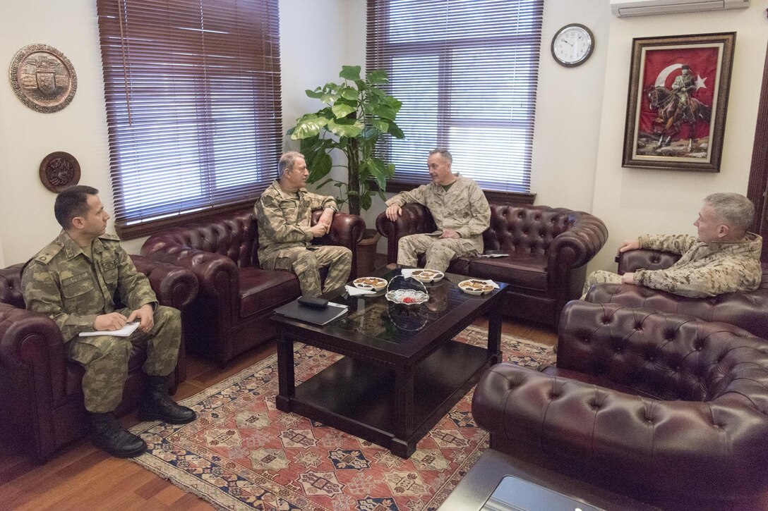 Marine Corps Gen. Joe Dunford, center right, chairman of the Joint Chiefs of Staff, meets with Gen. Hulusi Akar, chief of the Turkish General Staff, in Turkey, Feb. 17, 2017. The two met to enhance senior military cooperation between the two countries. DoD photo by Navy Petty Officer 2nd Class Dominique A. Pineiro
