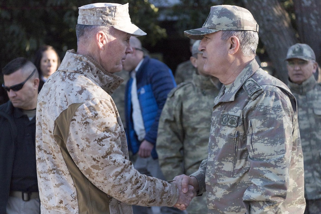 Marine Corps Gen. Joe Dunford, left, chairman of the Joint Chiefs of Staff, shakes hands withTurkish Army Gen. Hulusi Akar, chief of the Turkish General Staff, in Turkey, Feb. 17, 2017. DoD photo by Navy Petty Officer 2nd Class Dominique A. Pineiro
