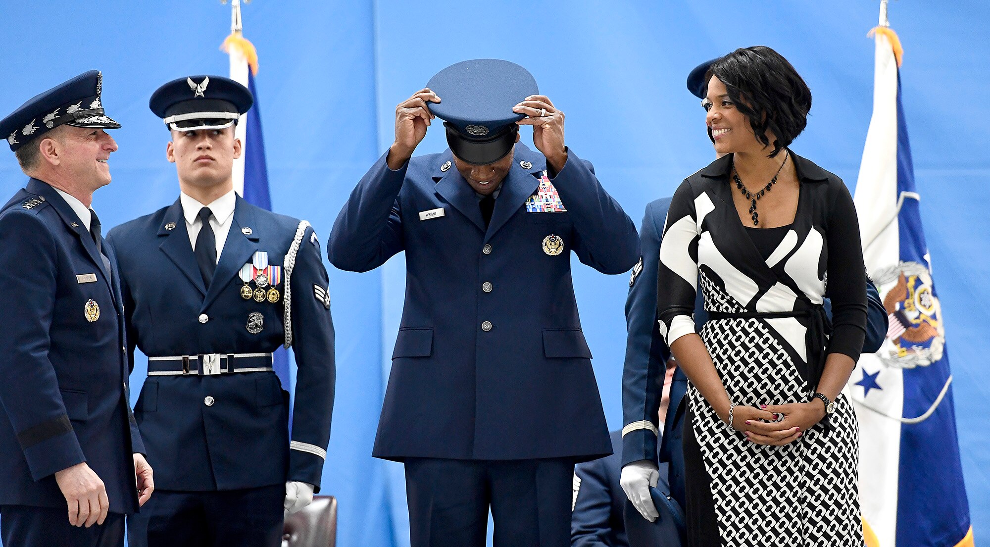 Chief Master Sgt. of the Air Force Kaleth O. Wright adjusts his new uniform hat for the first time during his appointment ceremony on Joint Base Andrews, Md., Feb. 17, 2017. Wright succeeds Chief Master Sgt. of the Air Force James A. Cody, who retires after 32 years of service, and he is the 18th Airman to hold this position. (U.S. Air Force photo/Scott M. Ash)
