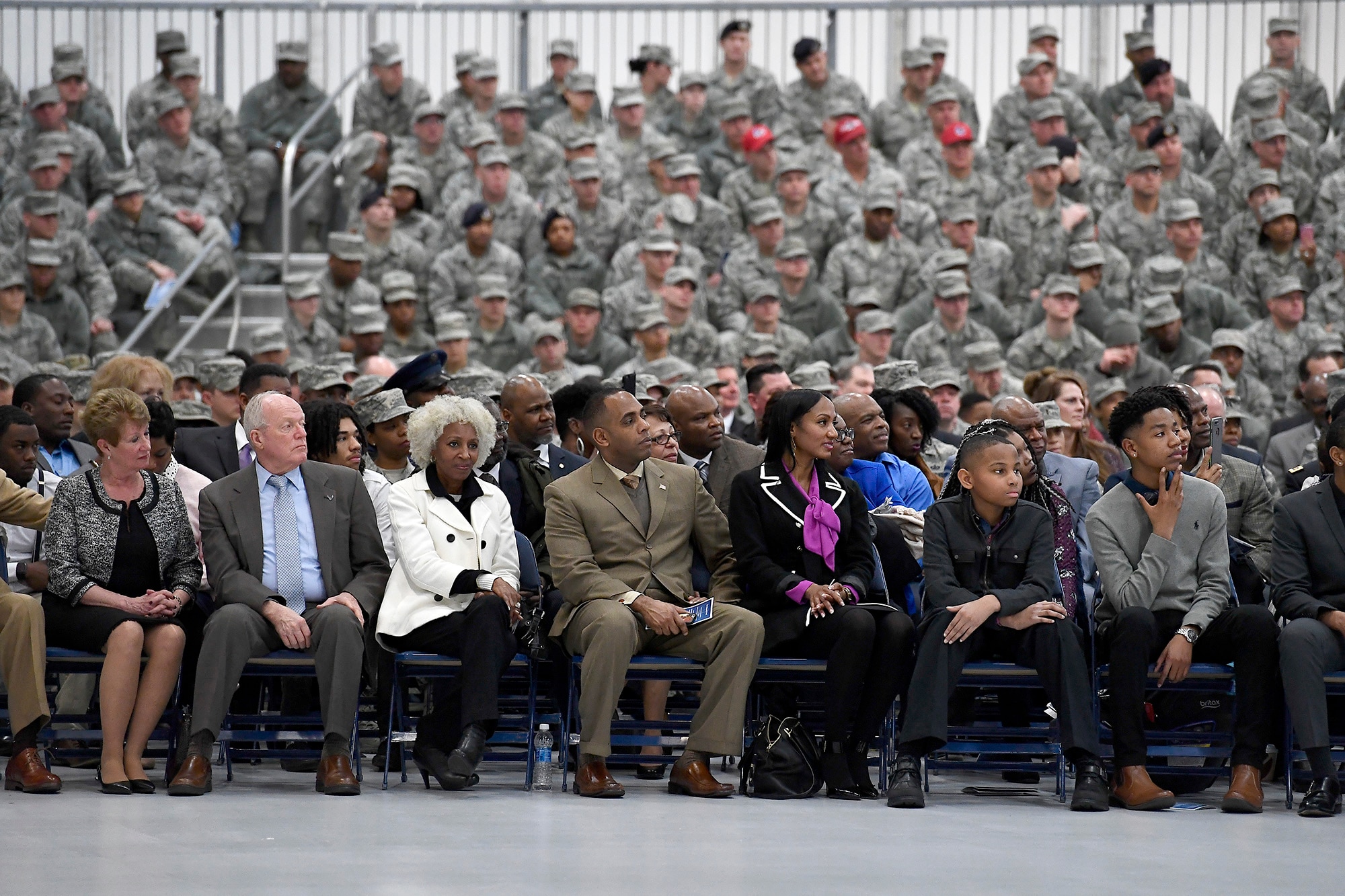 Family and friends of Chief Master Sgt. of the Air Force Kaleth O. Wright listen during his appointment ceremony on Joint Base Andrews, Md., Feb. 17, 2017. Wright succeeds Chief Master Sgt. of the Air Force James A. Cody, who retires after 32 years of service, as the 18th Airman to hold this position. (U.S. Air Force photo/Scott M. Ash)