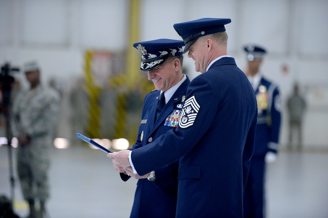 Air Force Chief of Staff Gen. David L. Goldfein retires Chief Master Sgt. of the Air Force James A. Cody during a retirement and appointment ceremony on Joint Base Andrews, Md., Feb. 17, 2017. Cody retires after 32 years of service and is succeeded by Chief Master Sgt. of the Air Force Kaleth O. Wright, the 18th Airman to hold this position. (U.S. Air Force photo/Andy Morataya)