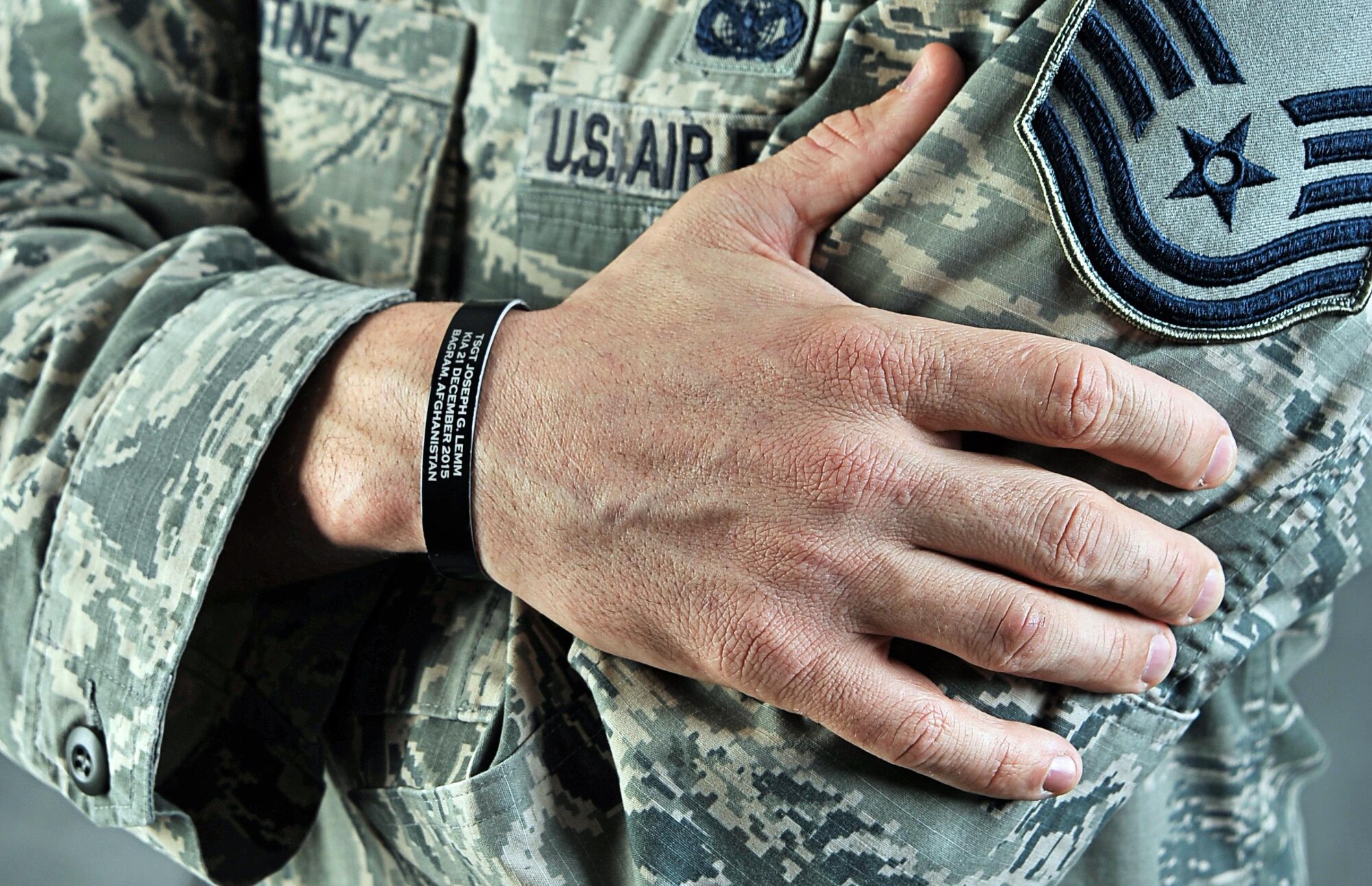 Master Sgt. Nicholas Whitney, 55th Security Forces Squadron, led a Fly Away Security Team (FAST) in Afghanistan from late 2015 to early 2016 that earned him the Air Force Outstanding Security Forces Senior Non-Commissioned Officer of the Year Award. While on deployment, Whitney's counterpart and friend, Tech. Sgt. Joseph Lemm, was killed. Whitney wears a braclet with his friends information on it to remind him of the good times with his friend and the sacrifice he made. (U.S. Air Force photo by Zachary Hada)