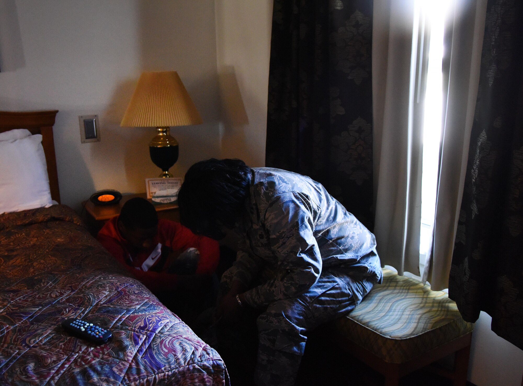 Chaplain (Capt.) Rashaundra Singleton, 81st Training Wing chaplain, provides assistance to Airman Basic Rendall Powell, 335th Training Squadron student, as he portrays the son of a “victim” during a next of kin notification during a train derailment exercise Feb. 16, 2017, on Keesler Air Force Base, Miss. The exercise scenario simulated a train and vehicle collision, which resulted in a derailment and chemical spill, creating a mass casualty and HAZMAT response event. This exercise tested base and local civilian emergency response organizations’ ability to operate in a multi-agency and multi-jurisdiction crisis situation. (U.S. Air Force photo by Kemberly Groue)
