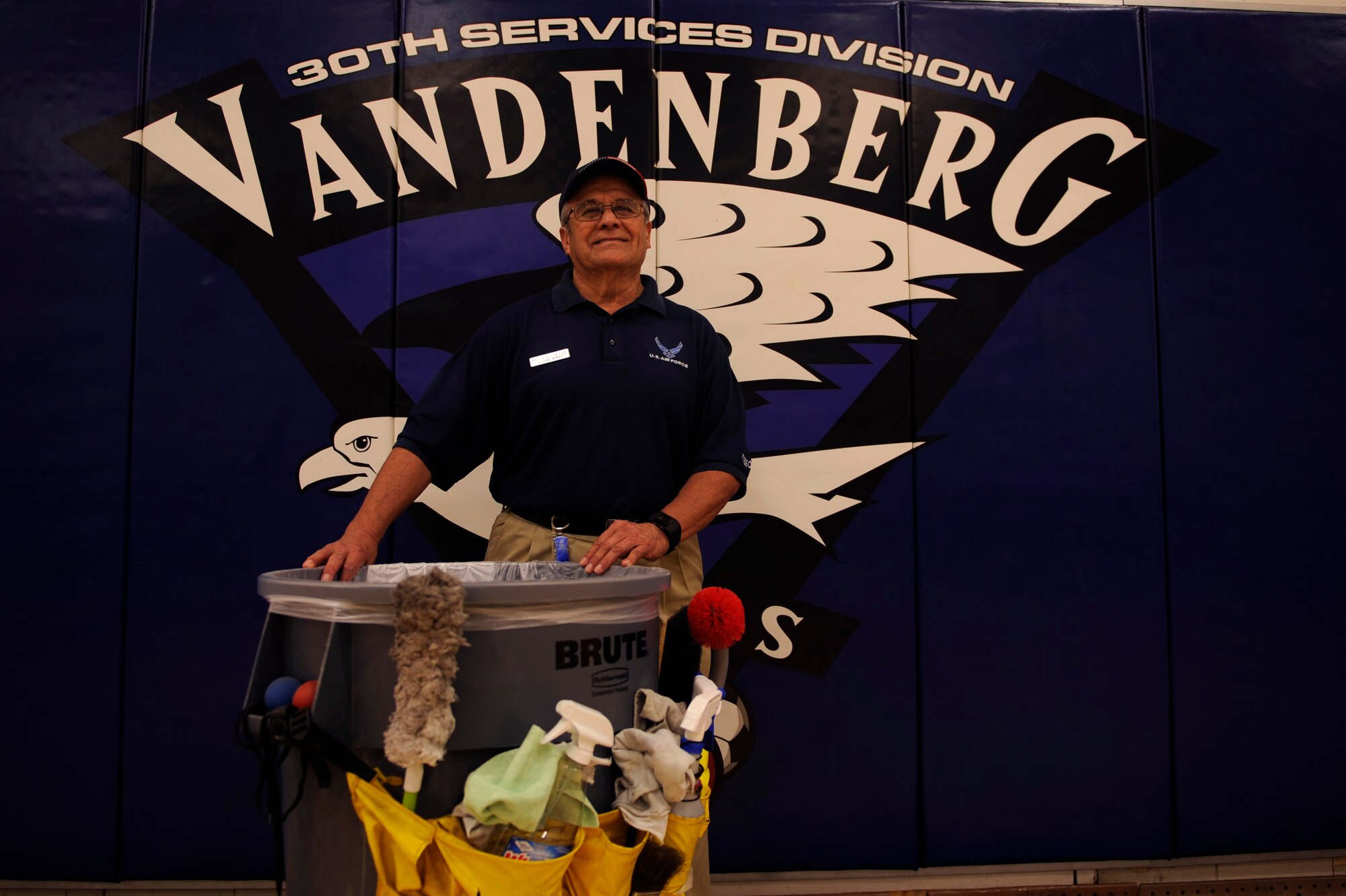 Retired Master Sgt. Joe Orsua, 30th Force Support Squadron fitness center custodian poses for a photo, Feb. 17, 2017, Vandenberg Air Force Base, Calif. Whether playing a direct role in launching rockets or smaller, yet still vital roles, like ensuring the base gyms are functional and sanitary, countless retirees have continued their already decades of service to their country. Orsua is one such unsung patriot. (U.S. Air Force photo by Staff Sgt. Shane Phipps /Released)