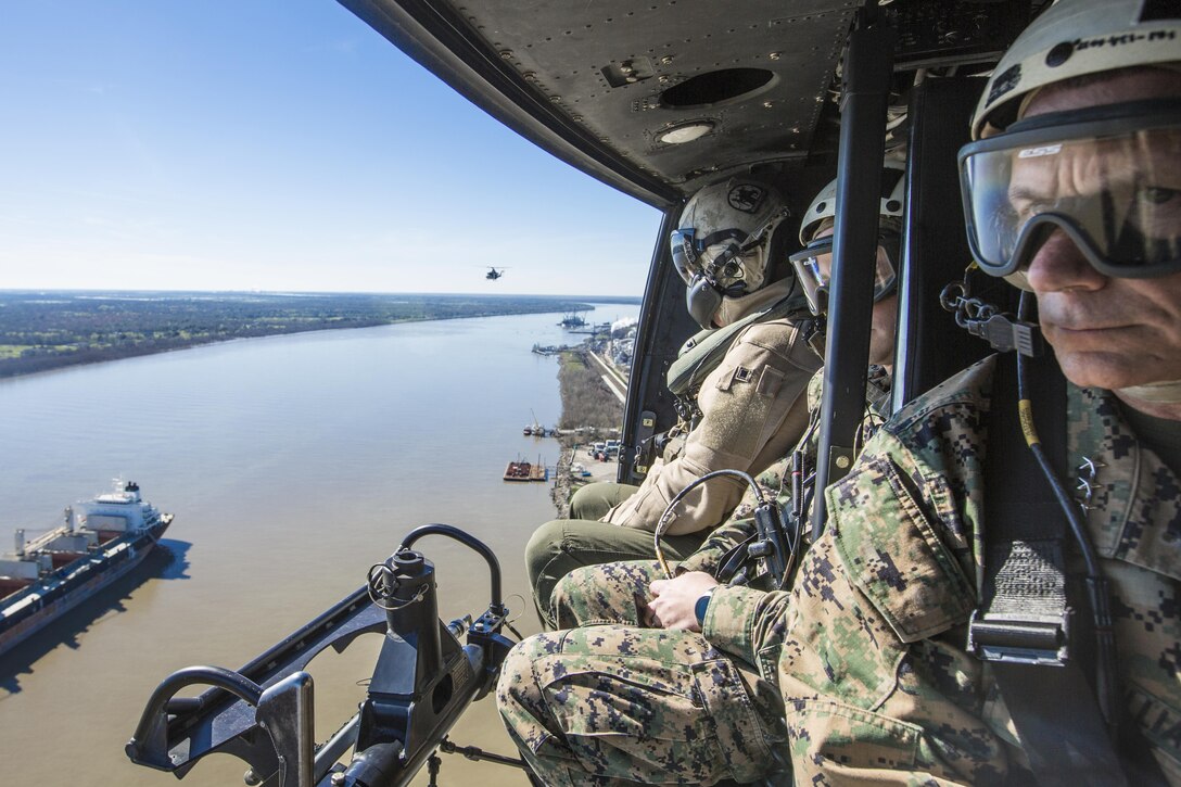 Marines ride in a UH-1Y Venom over New Orleans, Feb. 16, 2017. Marine Corps photo by Cpl. Samantha K. Braun