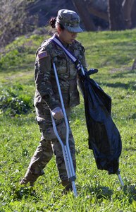 Pvt. Jacqueline Padilla of Company G, 232nd Medical Battalion wasn't about to let crutches stop her from helping to clean out the Salado Creek Park area at Joint Base San Antonio-Fort Sam Houston Feb. 17 at the 2017 Basura Bash.