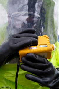 An Army Reserve Soldier uses a multiple gas monitor near suspected hazardous material inside a large shipping container during joint training with the Miami-Dade Fire Rescue Department (MDFR), at the Port of Miami during a joint HAZMAT exercise on Feb. 18, 2017 in Miami, Fla. The 329th Chemical, Biological, Radiological, and Nuclear (CBRN) Company (Reconnaissance and Surveillance), from Orlando, Fla., the Army Reserve’s 469th Ground Ambulance Company, from Wichita, Kan., and the Florida National Guard’s Civil Support Team, spent the day training with MDFR firefighters during a sustainment training exercise that combines civil authorities and Defense CBRN Response Force. The Miami event was the second training exercise of its kind for Northern Command. The first exercise held with a municipality was in New York City. The 329th CBRN Company is the only chemical company on the DCRF. The DCRF mission is to save lives, mitigate human suffering and facilitate recovery operations in a CBRN environment. The DCRF consists of 5,200 personnel to include Soldiers, Sailors, Airmen, Marines and civilians from active-duty and reserve component units. The DCRF is a scalable force that is part of a larger collaborative response capability between local, state, tribal and federal agencies. DCRF assets are used to support the primary agency in the event of a CBRN incident. (Army Reserve photo by Master Sgt. Mark Bell / Released)