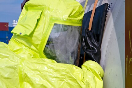 An Army Reserve Soldier uses his body weight to hold a patch to seal a hole on a tank containing hazardous materials during a joint HAZMAT training exercise with the Miami-Dade Fire Rescue Department (MDFR) at the Port of Miami on Feb. 18, 2017 in Miami, Fla. The 329th Chemical, Biological, Radiological, and Nuclear (CBRN) Company (Reconnaissance and Surveillance), from Orlando, Fla., the Army Reserve’s 469th Ground Ambulance Company, from Wichita, Kan., and the Florida National Guard’s Civil Support Team, spent the day training with MDFR firefighters during a sustainment training exercise that combines civil authorities and Defense CBRN Response Force. The Miami event was the second training exercise of its kind for Northern Command. The first exercise held with a municipality was in New York City. The 329th CBRN Company is the only chemical company on the DCRF. The DCRF mission is to save lives, mitigate human suffering and facilitate recovery operations in a CBRN environment. The DCRF consists of 5,200 personnel to include Soldiers, Sailors, Airmen, Marines and civilians from active-duty and reserve component units. The DCRF is a scalable force that is part of a larger collaborative response capability between local, state, tribal and federal agencies. DCRF assets are used to support the primary agency in the event of a CBRN incident. (Army Reserve photo by Master Sgt. Mark Bell / Released)