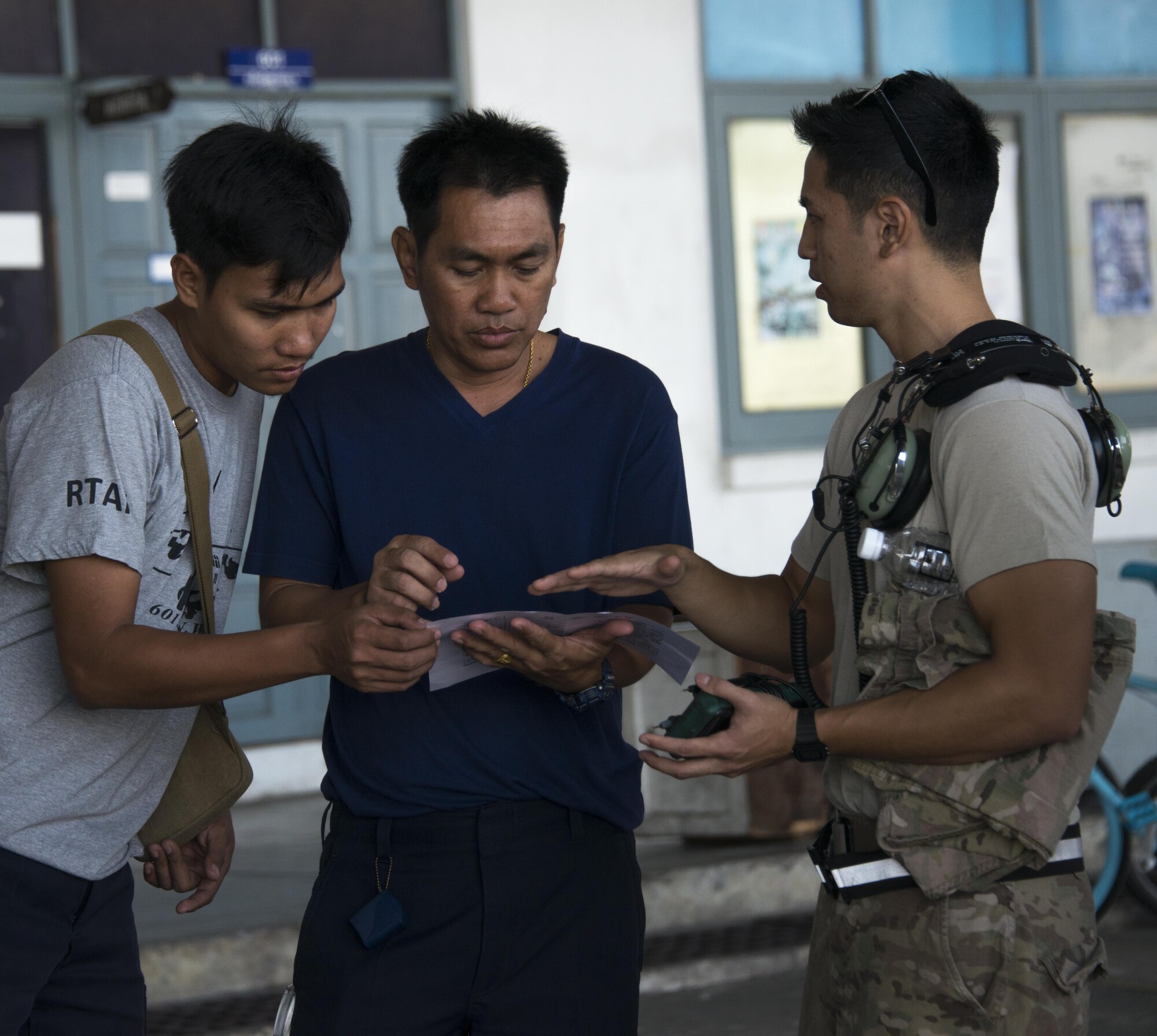 U.S. Air Force Staff Sgt. Dylan Daguay, 353rd Special Operations Maintenance Squadron electro-environmental systems craftsman, explains to maintainers from the Royal Thai Air Force 601st Squadron Maintenance Team how to troubleshoot wiring an engine, Feb. 8, 2017 at Don Mueang Air Base, Thailand. The 353rd SOMXS team included electro environmental, hydraulics, engines, fuels and the production superintendent, who worked with their RTAF counterparts to learn more about the way the RTAF does business, Feb. 6-9, 2017. (U.S. Air Force photo by Capt. Jessica Tait)