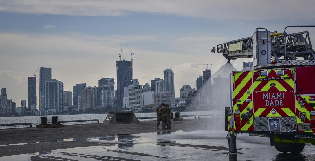 The sun sets at the Port of Miami, Feb. 18, 2017, as U.S. Army Reserve Soldiers from the 329th Chemical Company based in Orlando, Fla., and the Miami-Dade Fire Rescue Department prepare to clear the port after conducting a joint hazard material exercise. The Defense Chemical, Biological, Radiological, and Nuclear Response Force exercise hosted by MDFR and the Miami-Dade Port Authority encompassed the U.S. Army Reserve 329th Chemical Company, the Army Reserve’s 469th Ground Ambulance Company, from Wichita, Kan., and the Florida National Guard’s Civil Support Team. (U.S. Army Reserve photo by Master Sgt. Marisol Walker/Released)