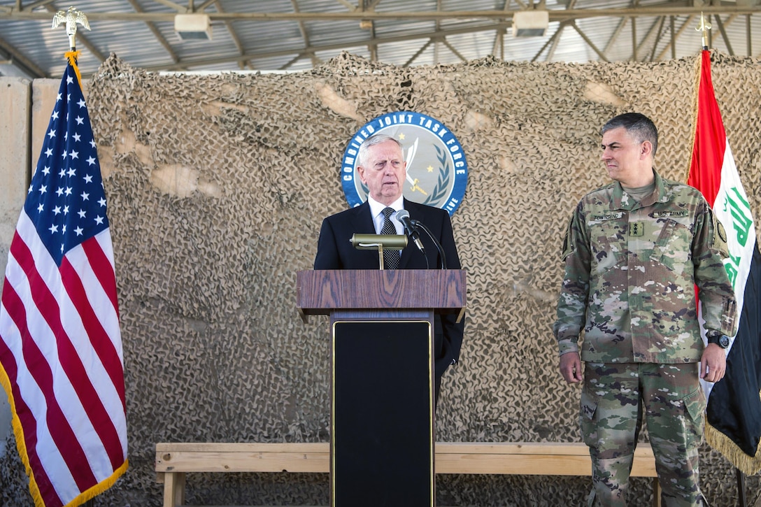 Defense Secretary Jim Mattis hosts a joint press conference with Army Lt. Gen. Stephen Townsend, commander of Combined Joint Task Force Operation Inherent Resolve, at Baghdad International Airport.