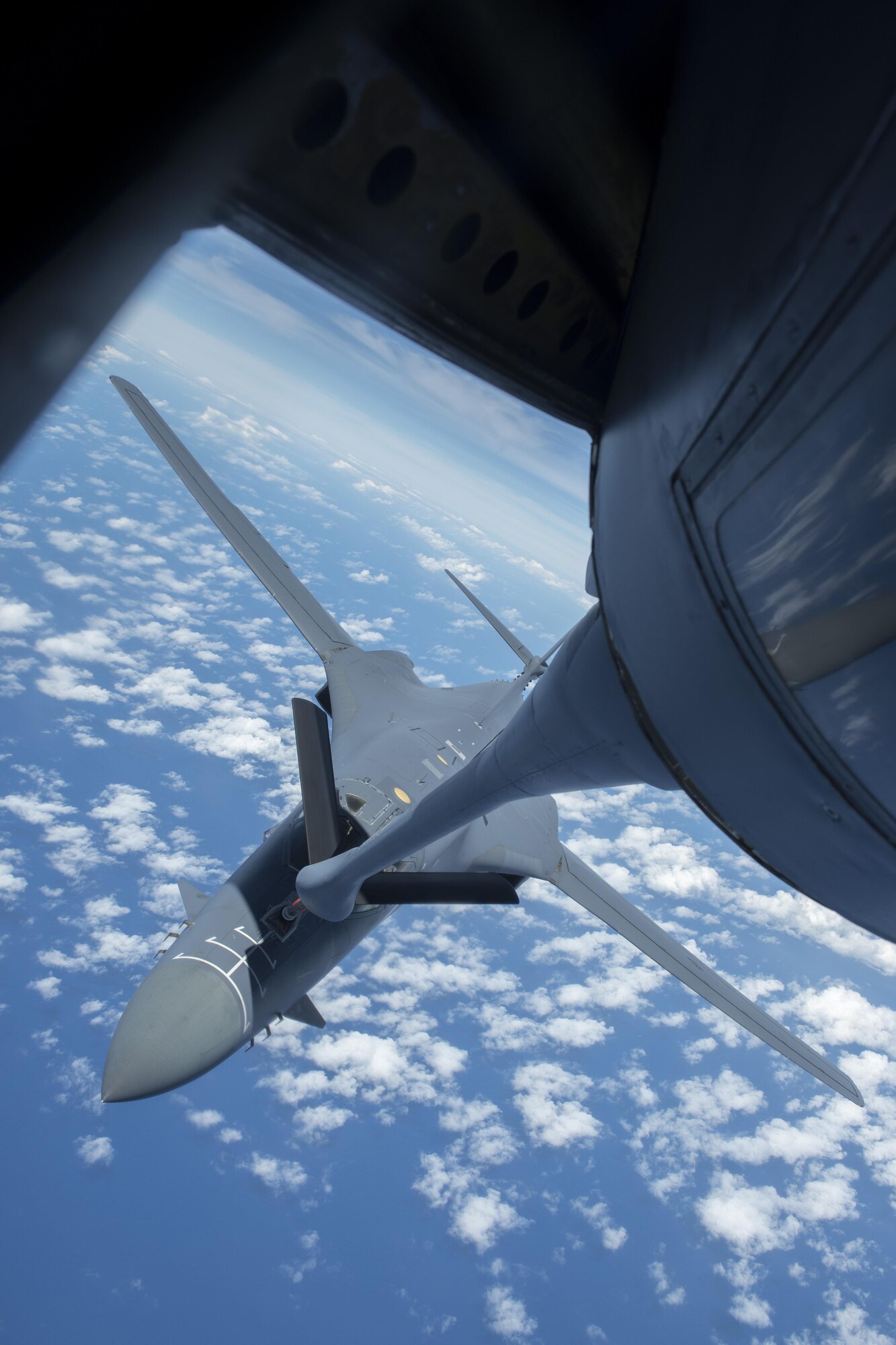 A U.S. Air Force B-1B Lancer assigned to the 9th Expeditionary Bomb Squadron receives fuel from a 909th Air Refueling Squadron KC-135 Stratotanker during annual exercise Cope North, Feb. 21, 2017. The 909th ARS’s motto is ‘Always There,’ symbolizing the squadron’s constant presence and devotion to support allies and partners throughout the Indo-Asia Pacific. (U.S. Air Force photo by Senior Airman John Linzmeier/released)