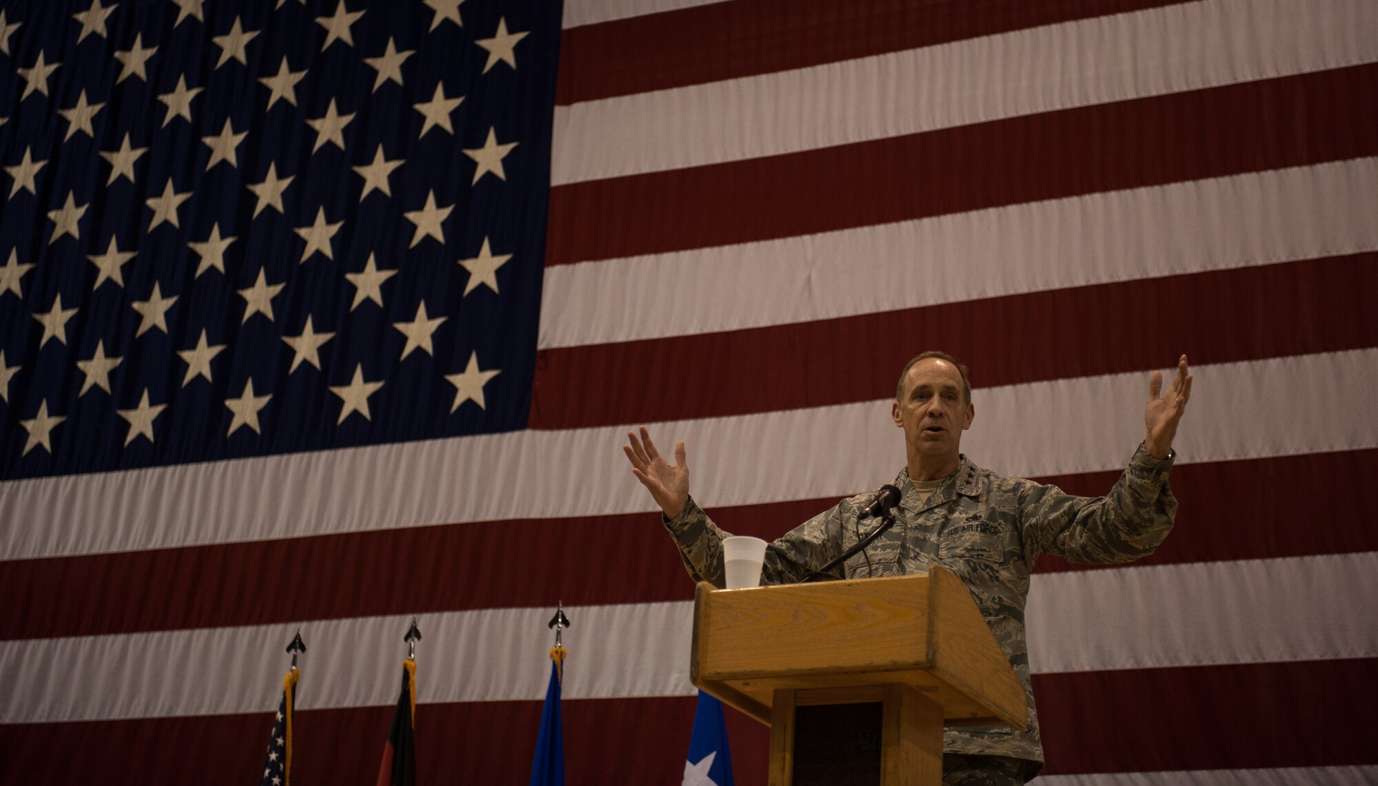 Lt. Gen. John B. Cooper, headquarters U.S. Air Force deputy chief of staff for logistics, engineering and force protection, speaks to the crowd of maintainers and logistics Airmen at the 2016 Maintenance and Logistics Airmen Annual Award Ceremony on Ramstein Air Base, Germany, Feb. 17, 2017. Cooper is responsible to the Chief of Staff for leadership, management and integration of Air Force logistics readiness, aircraft, munitions, missile maintenance, civil engineering, and security forces. (U.S. Air Force photo by Senior Airman Lane T. Plummer)