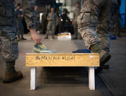 Airmen from the 86th Maintenance Squadron take part in team building before the 2016 Maintenance and Logistics Airmen Annual Award Ceremony on Ramstein Air Base, Germany, Feb. 17, 2017. The awards brought together Airmen within the maintenance and logistics career fields and rewarded the hardest-working ones with annual awards. (U.S. Air Force photo by Senior Airman Lane T. Plummer)