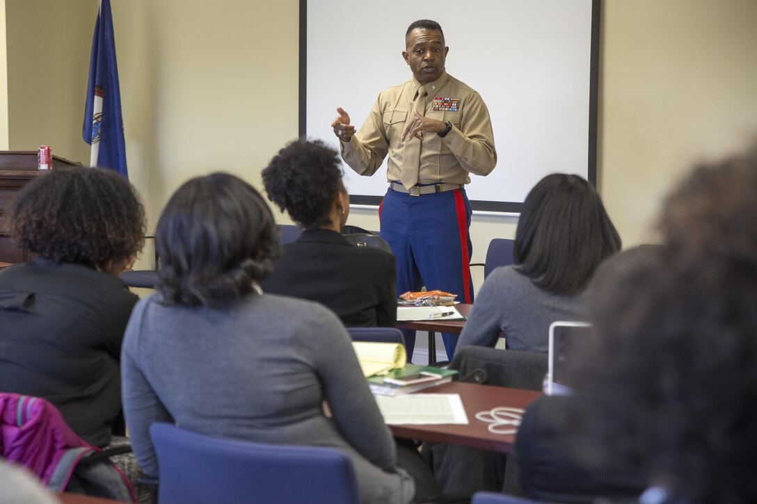 Marine Col. C. Derek Campbell speaks to students at a two-day Marine Corps Leadership Seminar, as part of the Emerging Leaders Program, at the Gloucester Institute in Gloucester, Va., Feb. 17-18. The MCLS is an event the Marine Corps hosts several times throughout the year across the nation, which fosters ongoing relationships to generate awareness and knowledge on the Corps to diverse communities. Campbell is the liaison officer for the Joint Improvised Threat Defeat Orginization at the Pentagon.