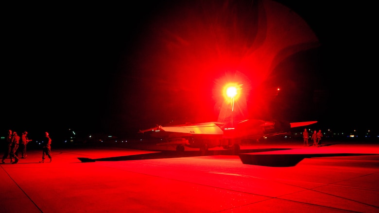 An F/A-18C Hornet with Marine Fighter Attack Squadron (VMFA) 323 “Death Rattlers” waits to conduct night operations at Naval Air Station Fallon, Nev., Feb. 15. The Death Rattlers, one of two Marine Hornet squadrons to deploy aboard Navy aircraft carriers, trained at NAS Fallon to strengthen tactical air integration, fulfill predeployment requirements and build rapport with the Navy squadrons they will deploy with in summer 2017. (U.S. Marine Corps photo by Sgt. Lillian Stephens/Released)