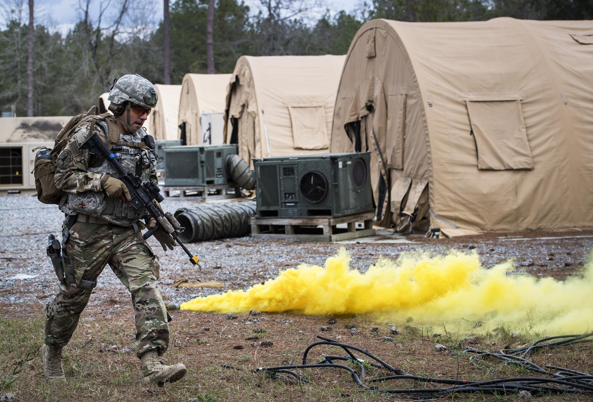 Tech. Sgt. Jeremiah Johnson, 822d Base Defense Squadron, responds to a simulated attack during a Full Mission Profile exercise, Feb. 15, 2017, at Moody Air Force Base, Ga. The 822d BDS is completing training exercises that will gradually increase in difficulty each week to prepare for an upcoming Mission Readiness exercise. The FMP enhanced training by increasing the complications and dangers of scenarios that challenged Airmen on simulated patrols. The exercise also pushed leadership in the Tactical Operation Center to successfully guide the Airmen through the challenges. (U.S. Air Force photo by Airman 1st Class Janiqua P. Robinson)