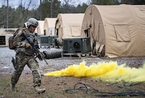 Tech. Sgt. Jeremiah Johnson, 822d Base Defense Squadron, responds to a simulated attack during a Full Mission Profile exercise, Feb. 15, 2017, at Moody Air Force Base, Ga. The 822d BDS is completing training exercises that will gradually increase in difficulty each week to prepare for an upcoming Mission Readiness exercise. The FMP enhanced training by increasing the complications and dangers of scenarios that challenged Airmen on simulated patrols. The exercise also pushed leadership in the Tactical Operation Center to successfully guide the Airmen through the challenges. (U.S. Air Force photo by Airman 1st Class Janiqua P. Robinson)
