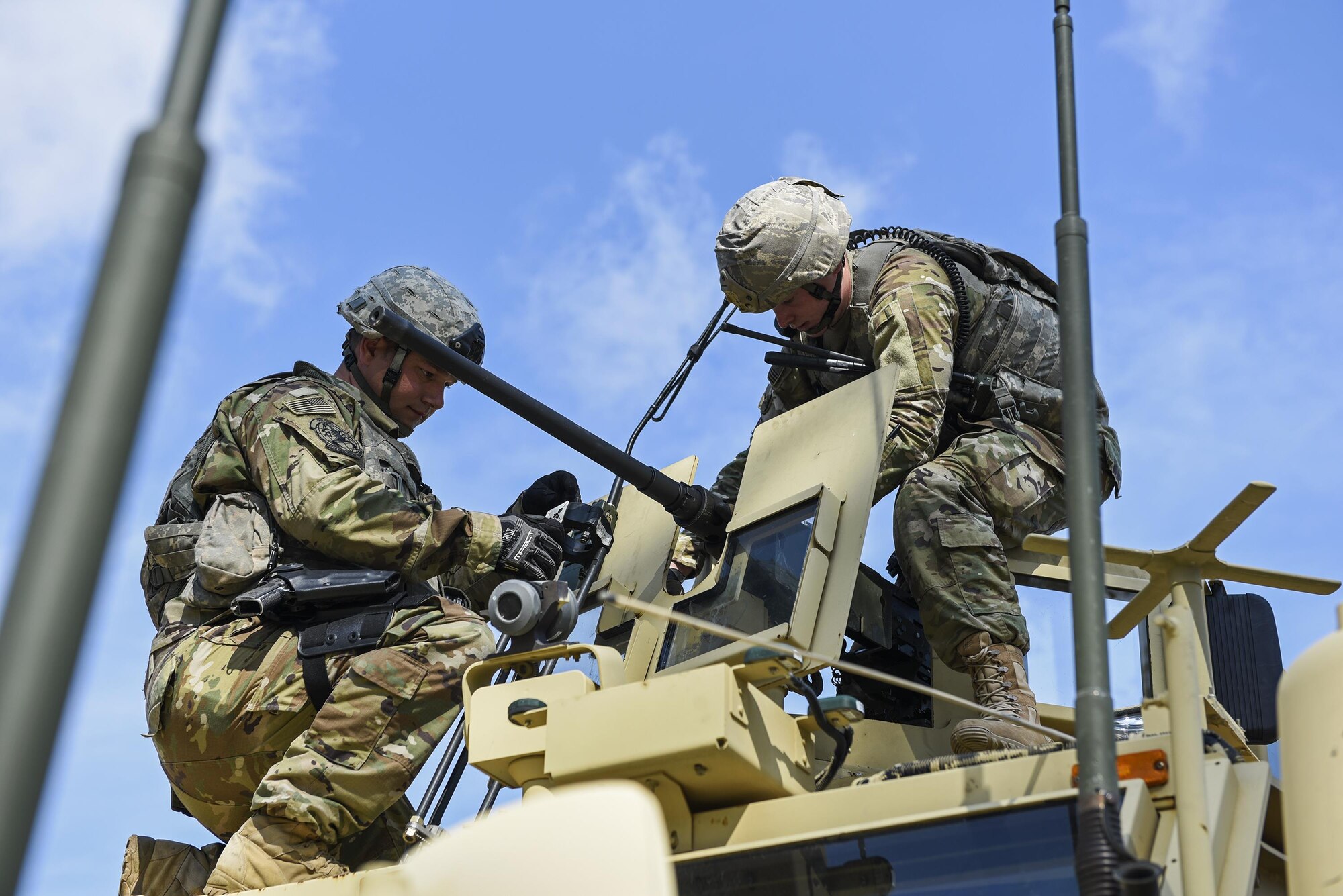 Airmen from the 822d Base Defense Squadron set up a mounted .50 caliber gun during a Full Mission Profile exercise, Feb. 14, 2017, at Moody Air Force Base, Ga. The 822d BDS is completing training exercises that will gradually increase in difficulty each week to prepare for an upcoming Mission Readiness exercise. The FMP enhanced training by increasing the complications and dangers of scenarios that challenged Airmen on simulated patrols. The exercise also pushed leadership in the Tactical Operation Center to successfully guide the Airmen through the challenges. (U.S. Air Force photo by Airman 1st Class Janiqua P. Robinson)