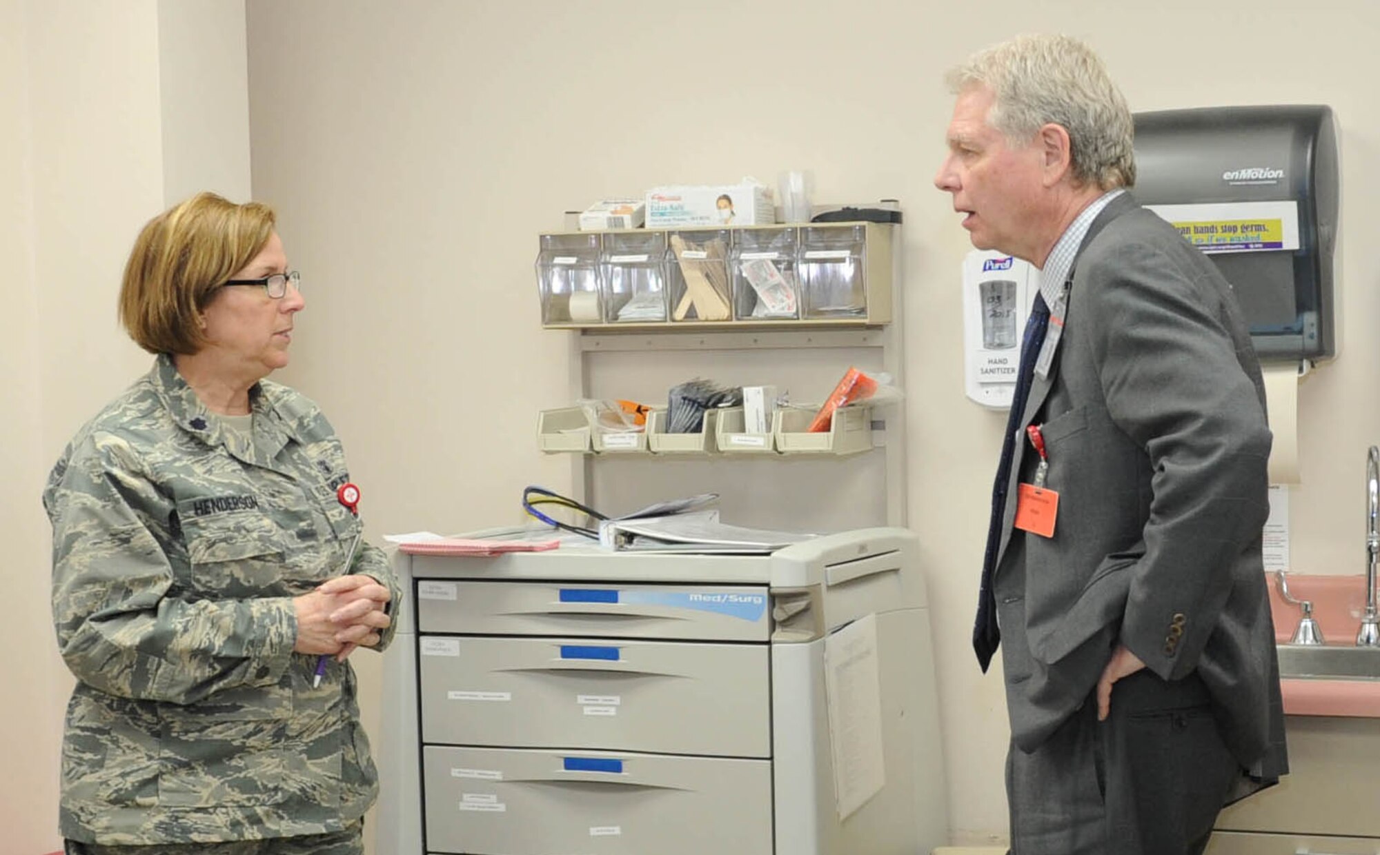 Lt. Col. Jo Anne Henderson, 22nd Medical Group health care integrator, listens to Dennis Levin, Joint Commission surveyor, give consultative recommendations while touring the base clinic, Feb. 13, 2017 at the McConnell Medical Treatment Facility. The Joint Commission conducted a three-day, on-site survey to ensure the clinic’s standards and practices are up-to-date and compliant with regulations. (U.S. Air Force photo/Senior Airman Tara Fadenrecht)