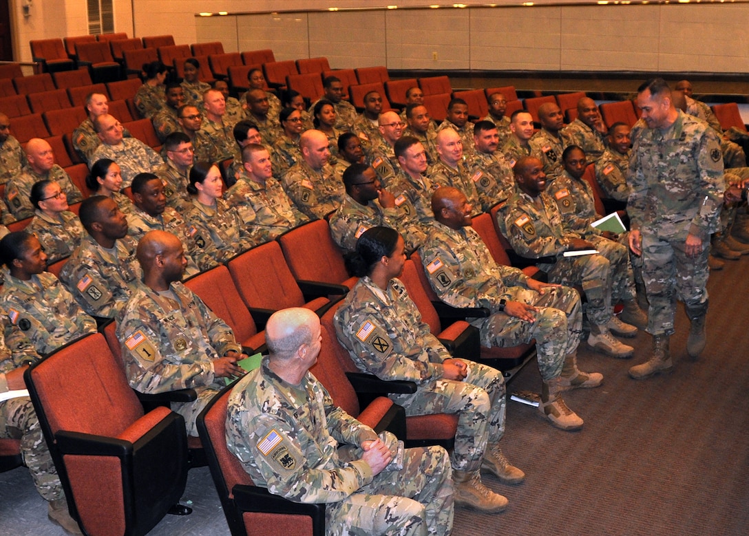 DLA senior enlisted leader Command Sgt. Major Charles Tobin (right) greets senior enlisted men and women of the Combined Arms Support Command in Fort Lee, Virginia, Feb. 16. Photo by Chris Erbe