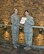 Brig. Gen. Ellen Moore (left), Air Reserve Personnel Center commander, presents Tech. Sgt. Amee Espinoza, Personnel Customer Service Manager for the ARPC Total Force Service Center, with a letter of congratulations from Lt. Gen. Maryanne Miller, commander of Air Force Reserve Command, for her selection as the AFRC nomination for the 2016 GEICO Military Service Award. Espinoza completed more than 600 hours of direct and indirect counseling services with individuals and groups focused on DUI and DWIs, addiction, domestic violence, conflict resolution, and anger management. (U.S. Air Force photo by Master Sgt. Beth Anschutz)