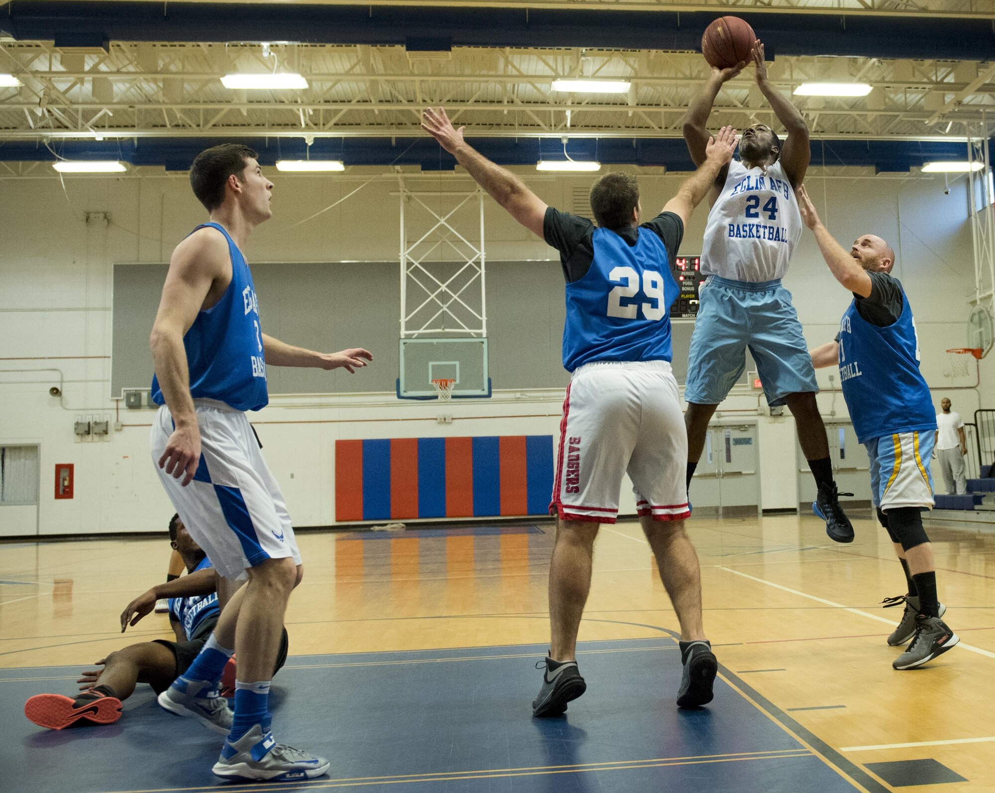 The 33rd Maintenance Squadron’s Aaron McKenzie takes a shot at the basket during his team’s intramural game against the Armament Directorate Feb. 16 at Eglin Air Force Base, Fla.  The Directorate team trailed for most of the game before dominating the last third in route to a 67-53 win.  (U.S. Air Force photo/Samuel King Jr.)