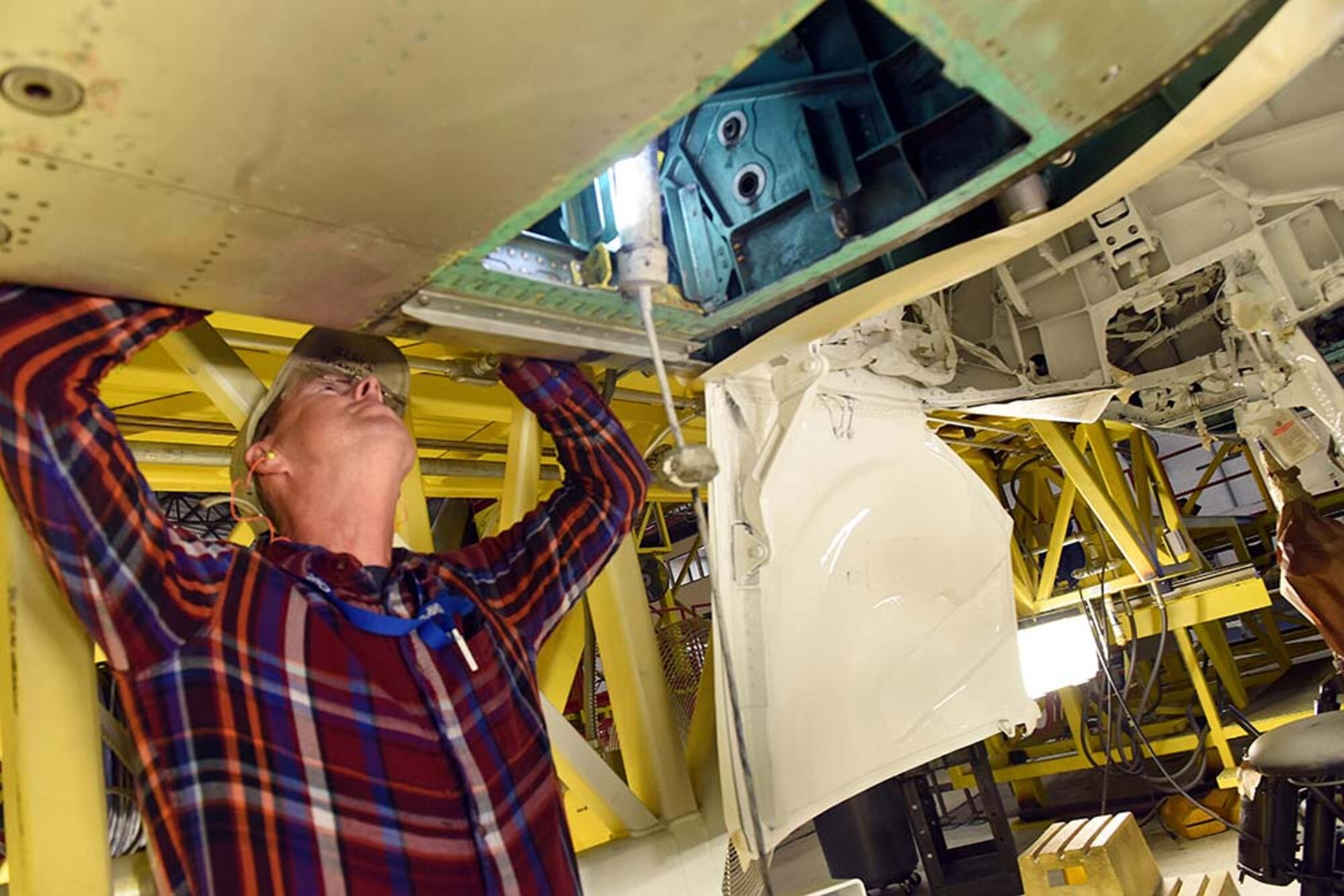 Kenneth Johnson, 561st Aircraft Maintenance Squadron electronics technician, examines a wiring harness on an F-15, during depot maintenance Feb. 16, 2017, at Robins Air Force Base. (U.S. Air Force photo by Tommie Horton/Released)