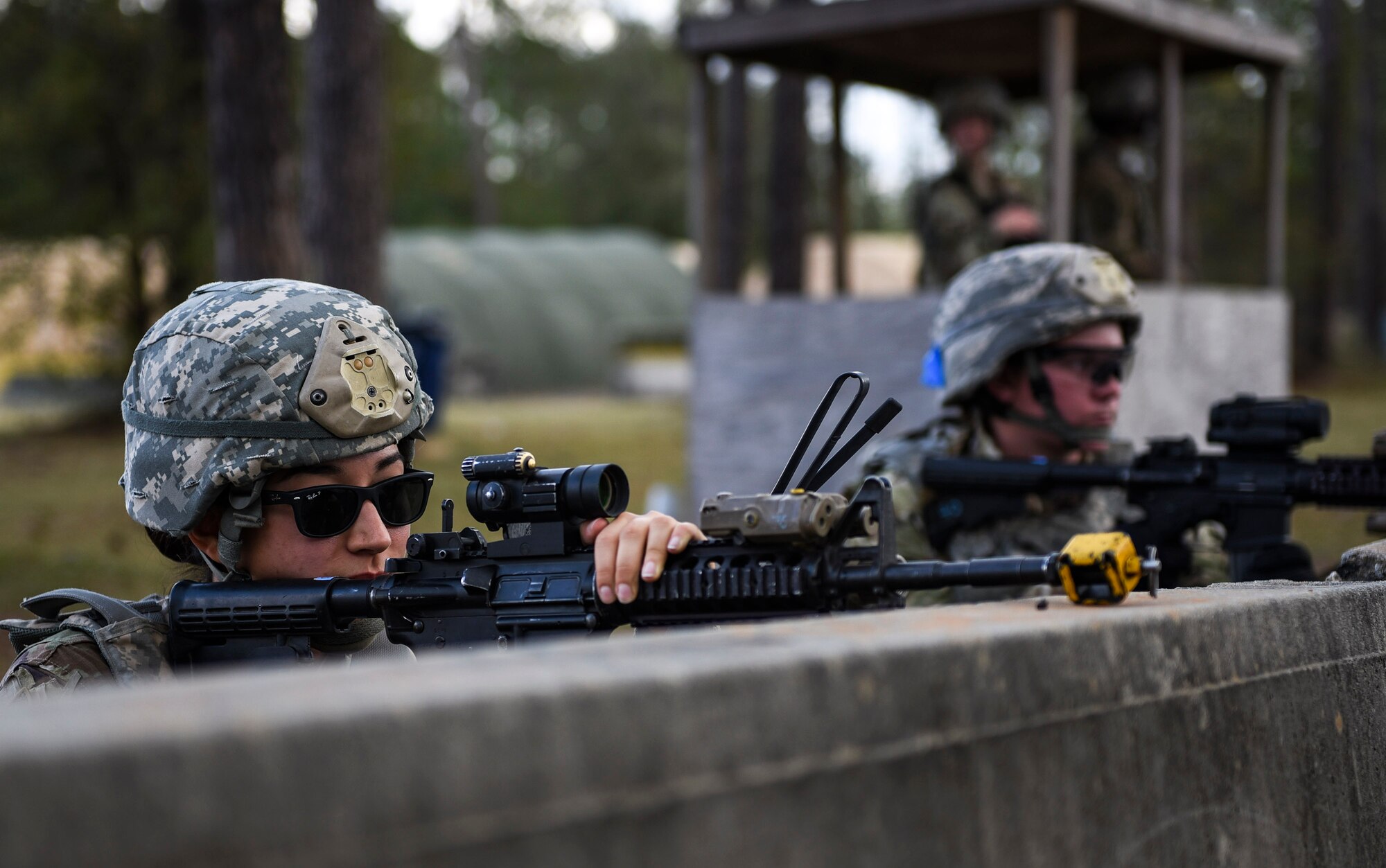 Airmen from the 822d Base Defense Squadron provide extra security in response to a simulated attack during a Full Mission Profile exercise, Feb. 15, 2017, at Moody Air Force Base, Ga. The 822d BDS is completing training exercises that will gradually increase in difficulty each week to prepare for an upcoming Mission Readiness exercise. The FMP enhanced training by increasing the complications and dangers of scenarios that challenged Airmen on simulated patrols. The exercise also pushed leadership in the Tactical Operation Center to successfully guide the Airmen through the challenges. (U.S. Air Force photo by Airman 1st Class Janiqua P. Robinson)