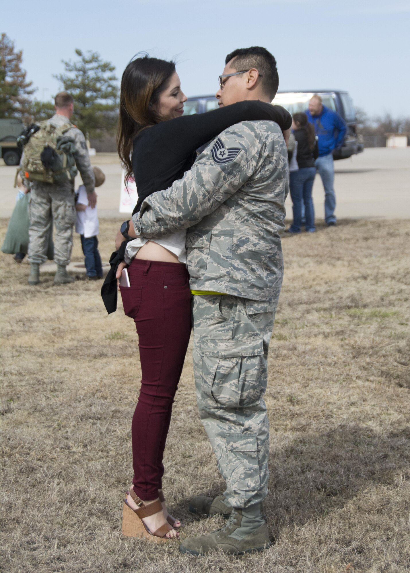 Tech. Sgt. Jose Martinez of the 507th Aircraft Maintenance Squadron and his wife, Cecilia, embrace following a deployment Feb. 17, 2017, at Tinker Air Force Base, Okla. More than 90 Reservists deployed in December 2016 in support of air operations at Incirlik Air Base, Turkey, against the Islamic State group. (U.S. Air Force photo/Tech. Sgt. Lauren Gleason)