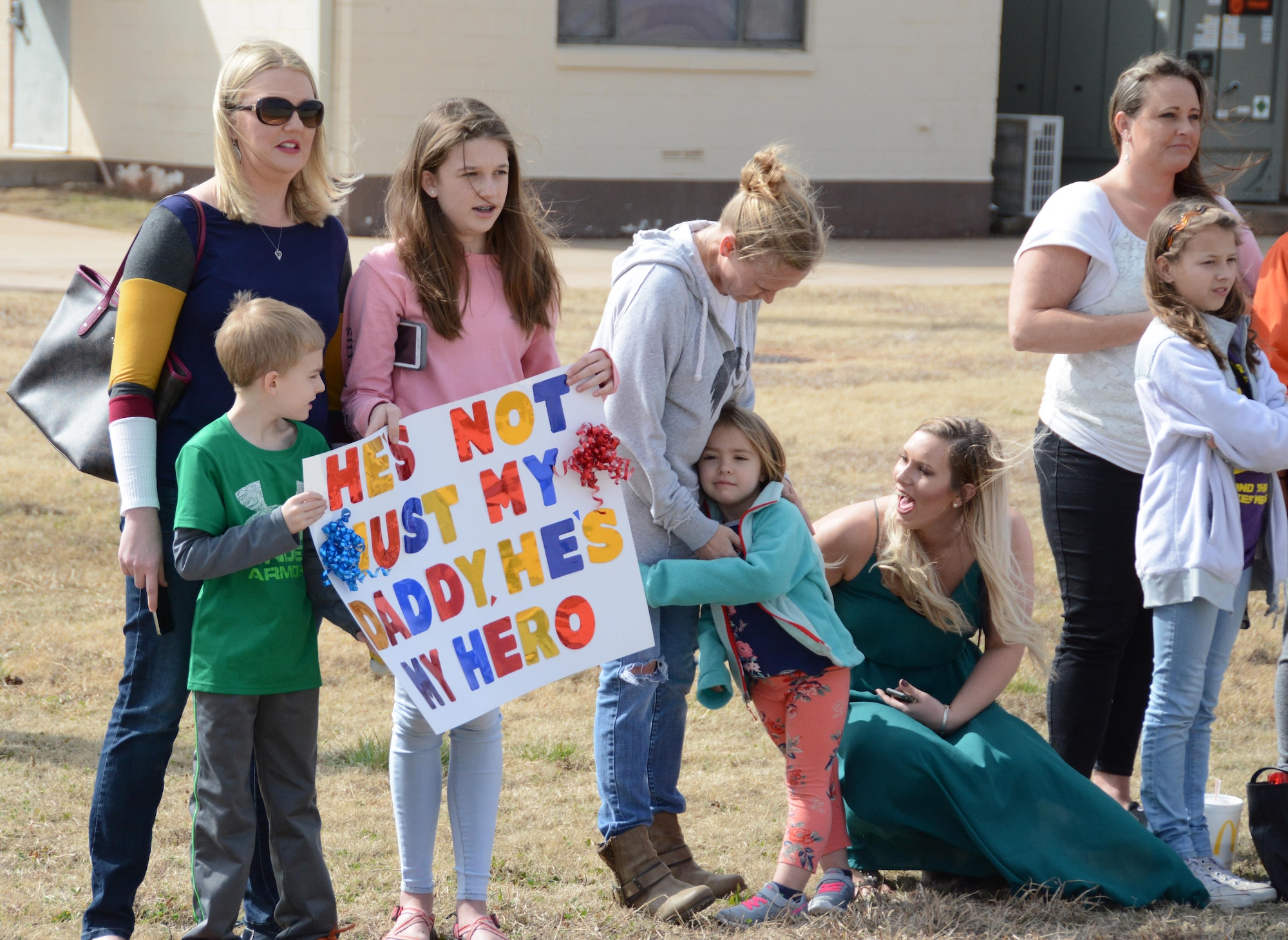 Racheal Geary and her children Courtney and Jacob await the arrival of her husband, Maj. Jason Geary, 507th Aircraft Maintenance Squadron commander, following a deployment Feb. 19, 2017, at Tinker Air Force Base, Okla. More than 90 Reservists deployed in December 2016 in support of air operations at Incirlik Air Base, Turkey, against the Islamic State group. (U.S. Air Force photo/Tech. Sgt. Lauren Gleason)