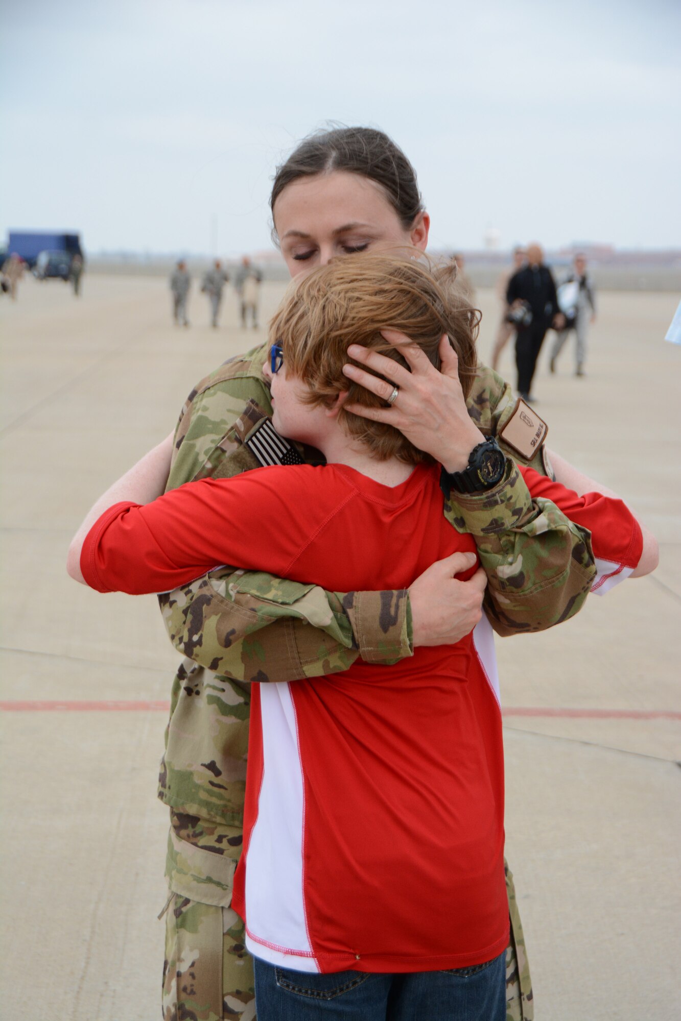 Senior Airman Brandy Hill of the 465th Air Refueling Squadron hugs her son Lukas following a deployment Feb. 19, 2017, at Tinker Air Force Base, Okla. More than 90 Reservists deployed in December 2016 in support of air operations at Incirlik Air Base, Turkey, against the Islamic State group. (U.S. Air Force photo/Tech. Sgt. Lauren Gleason)