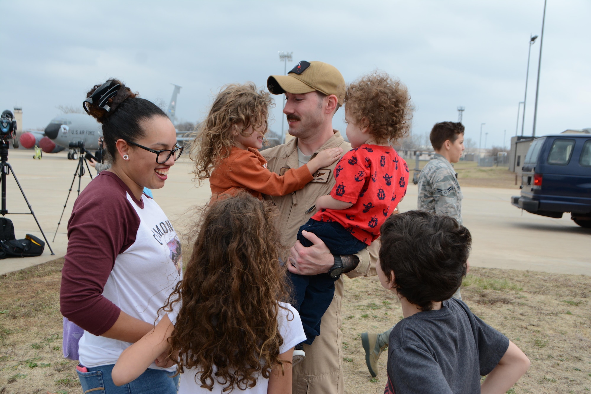 Tech. Sgt. Ryan Cornell of the 465th Air Refueling Squadron reunites with his  family following a deployment Feb. 19, 2017, at Tinker Air Force Base, Okla. More than 90 Reservists deployed in December 2016 in support of air operations at Incirlik Air Base, Turkey, against the Islamic State group. (U.S. Air Force photo/Tech. Sgt. Lauren Gleason)