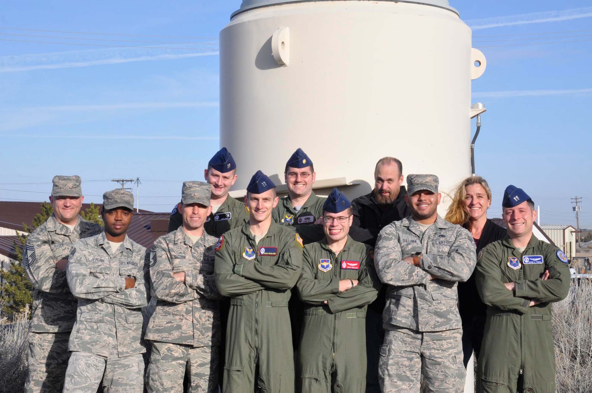 The 20th Air Force Olympic Sword team pose for a group photo at Hill Air Force Base, Utah., Feb. 17, 2017. The team of missile combat operators, missile maintainers and Technical Order Management Agency office members spent three weeks improving the two main technical orders used by missileers who operate the Minuteman III weapon system. (U.S. Air Force photo by 1st Lt. Veronica Perez)