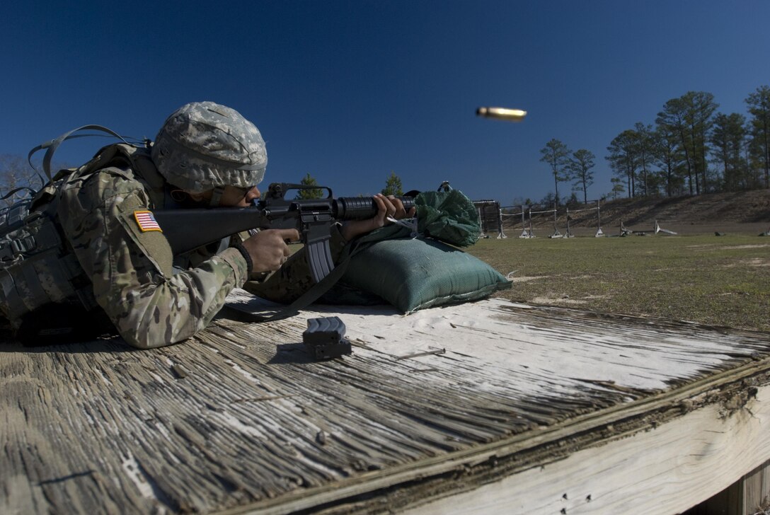 Spc. Joshua Thomas from Chicago, Illinois with the 757th Expeditionary Rail Center at Fort Sheridan, Illinois fires his weapon during the weapons qualification event. Weapons qualification is just one of the events in this year’s Deployment Support Command Best Warrior completions held at Fort Benning, Georgia. The winners of this competition will go on to compete in the 377th Theater Support Command's Best Warrior Competition beginning April 9 at Joint Base McGuire Dix Lakehurst, New Jersey.  