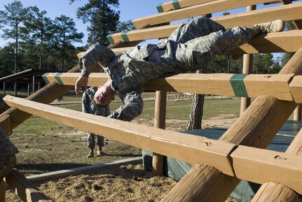 Spc. John Moore of Corpus Christi, Texas with the 370th Transportation Detachment out of Sinton, Texas descends an obstacle known as the “Weaver” at Fort Benning, Georgia. The obstacle course is just one of the events Soldiers competed in during the Deployment Support Command’s 2017 Best Warrior Competition. The annual competition pits Soldier against Soldier to earn the privilege of representing the Deployment Support Command at the next level of competition and eventually in the All Army Best Warrior Competition. 