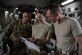 A team of nurses and technicians from the 455th Expeditionary Aeromedical Evacuation Squadron review an AE checklist before loading patients onto a C-17 Globemaster III aircraft at Bagram Air Field, Afghanistan. System Thinking helps teams of medical personnel operate at peak effectiveness and avoid preventable errors.