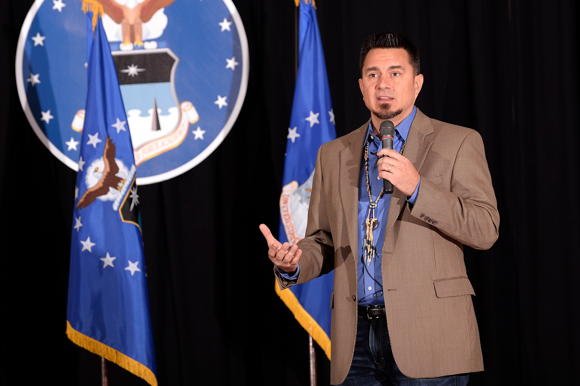 D.J. "Eagle Bear" Vanas, a motivational speaker and member of the Odawa Nation, speaks to cadets and staff Feb. 16, 2017 at the Prayer Lunch hosted by the U.S. Air Force Academy. Vanas, a 1993 graduate of the Academy, spoke about the importance of accepting the spiritual practices of others and how a spiritual belief system can lead to holistic growth. (U.S. Air Force photo/Mike Kaplan)