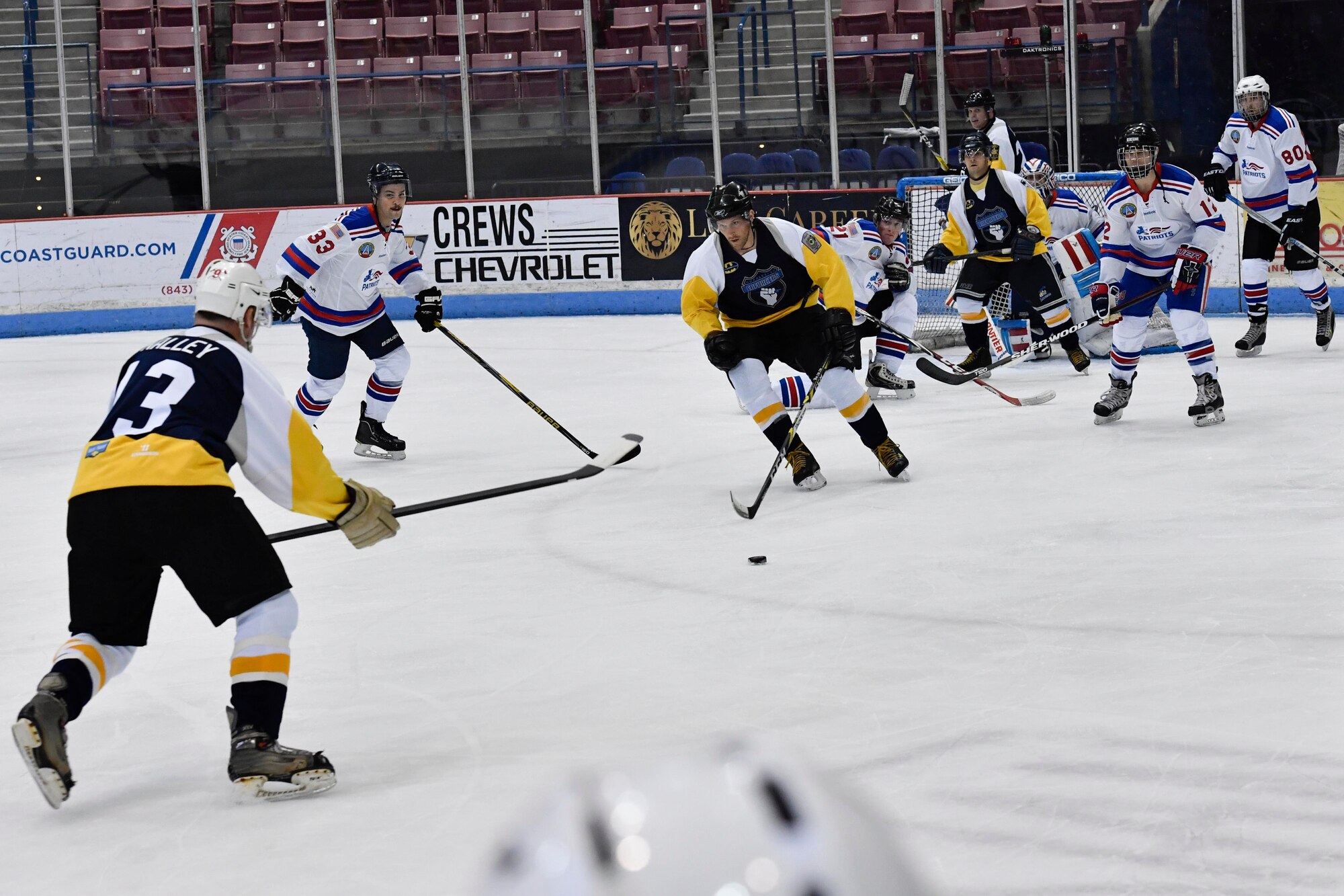 Members of the Charleston Patriots and the Charleston Enforcers skate during the 3rd Annual Matuskovic Charity Hockey Game at the North Charleston Coliseum & Performing Arts Center, Feb. 18, 2017. The game is played in memory of Joe Matuskovic, Charleston County Sherriff’s deputy, and other service members and first responders killed in the line of duty.  Members of the Charleston Patriots are from Joint Base Charleston while members of the Charleston Enforcers are from the Charleston County Sheriff’s office and fire department.The Charleston Enforcers won the game with a final score of 10-2. 