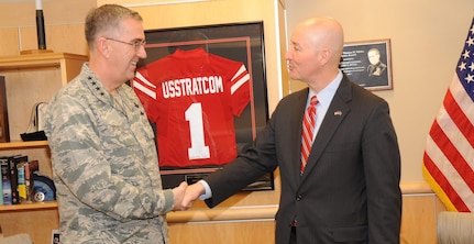 U.S. Air Force Gen. John E. Hyten, commander of U.S. Strategic Command (USSTRATCOM), welcomes Nebraska Gov. Pete Ricketts to USSTRATCOM headquarters, Offutt Air Force Base, Neb., Feb. 17, 2017.  Ricketts and Hyten discussed USSTRATCOM’s missions, roles and responsibilities, and explored potential partnering opportunities from which Nebraska and USSTRATCOM could benefit.