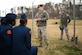 Tech. Sgt. Joseph Stoltz, 11th Security Forces Squadron military working dog handler, briefs Baltimore Polytechnic Institute High School Air Force Junior Reserve Officer Training Corps cadets during a base tour at Joint Base Andrews, Md., Feb. 16, 2017. The tour is part of an annual visitation program with the Air Education and Training Command and sponsored ROTC and JROTC programs. (U.S. Air Force photo by Senior Airman Delano Scott)