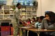 U.S. Air Force Senior Airman Maricia Williams, 20th Dental Squadron oral preventative assistant, passes out dental hygiene tools at Shaw Air Force Base, S.C., Feb. 15, 2017. The dental hygiene tools consisted of items such as a toothbrush, a timer and toothpaste. (U.S. Air Force photo by Airman 1st Class Destinee Sweeney)