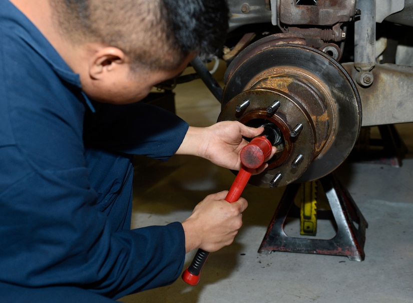 U.S. Air Force Senior Airman Evin Diaz, 733rd Logistics Readiness Squadron vehicle maintainer, replaces a vehicle’s wheel bearing after it is coated with a bio-based grease at Joint Base Langley-Eustis, Va., Jan. 31, 2017. A 12-month long experiment, will be performed on vehicles across the installation, to observe the impact that the bio-based grease has on vehicle life and maintenance longevity. (U.S. Air Force photo by Airman 1st Class Kaylee Dubois)
