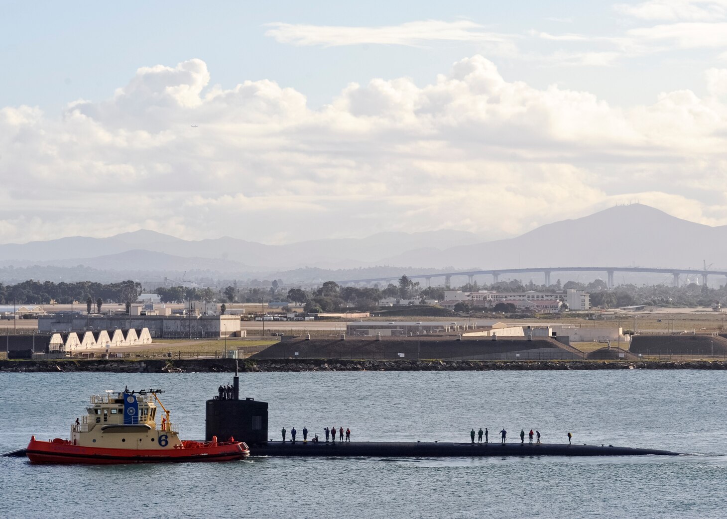 In this file photo, the Los Angeles-class fast-attack submarine USS Alexandria (SSN 757) transits San Diego Bay as it arrives to its new homeport of San Diego, Nov. 10, 2015. Alexandria joins Commander, Submarine Squadron 11 after a scheduled two-year engineered overhaul on the East Coast.