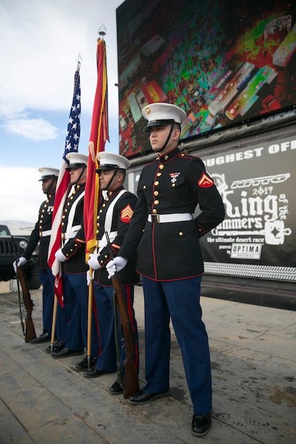 The Combat Center Color Guard Present the National and Marine Corps Colors prior to the King of the Hammers Race in Johnson Valley, Calif., Feb. 10, 2017. ( Official Marine Corps Photo by Cpl. Julio McGraw/ Released)