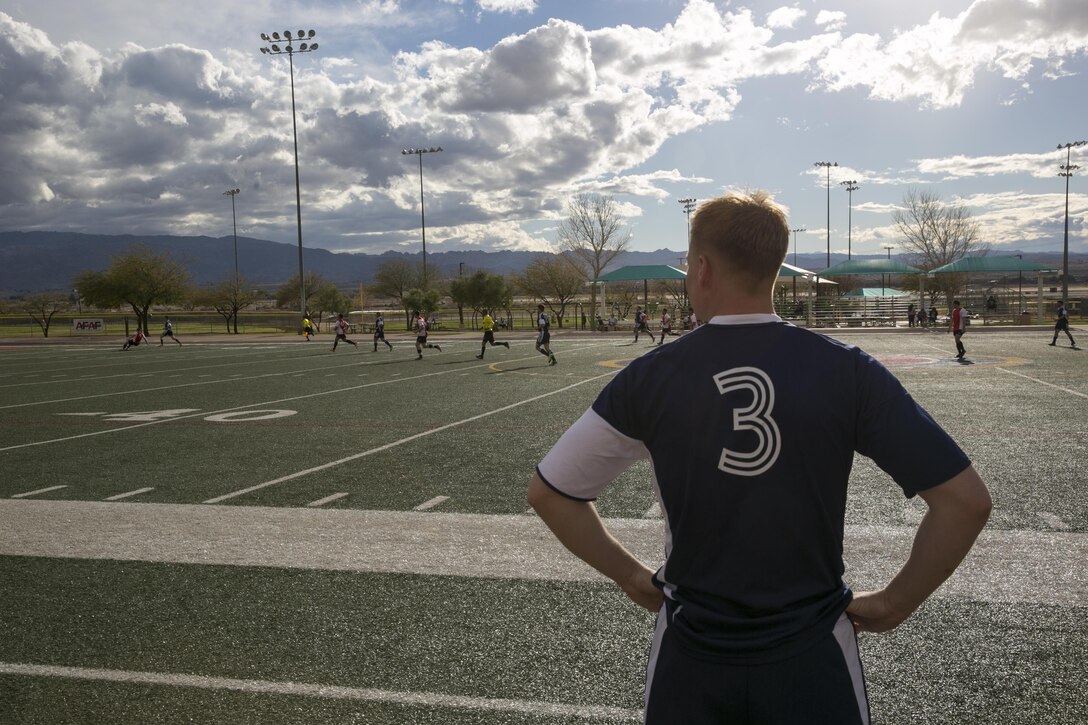 A player with 29 Palms Futbol Club waits for a substitution during a pre-season game versus Pendleton FC at Felix Field aboard Marine Corps Air Ground Combat Center, Twentynine Palms, Calif., Feb. 11, 2017. 29 Palms FC is preparing for a tournament at Fort Irwin National Training Center in April. (U.S. Marine Corps photo by Lance Cpl. Dave Flores)