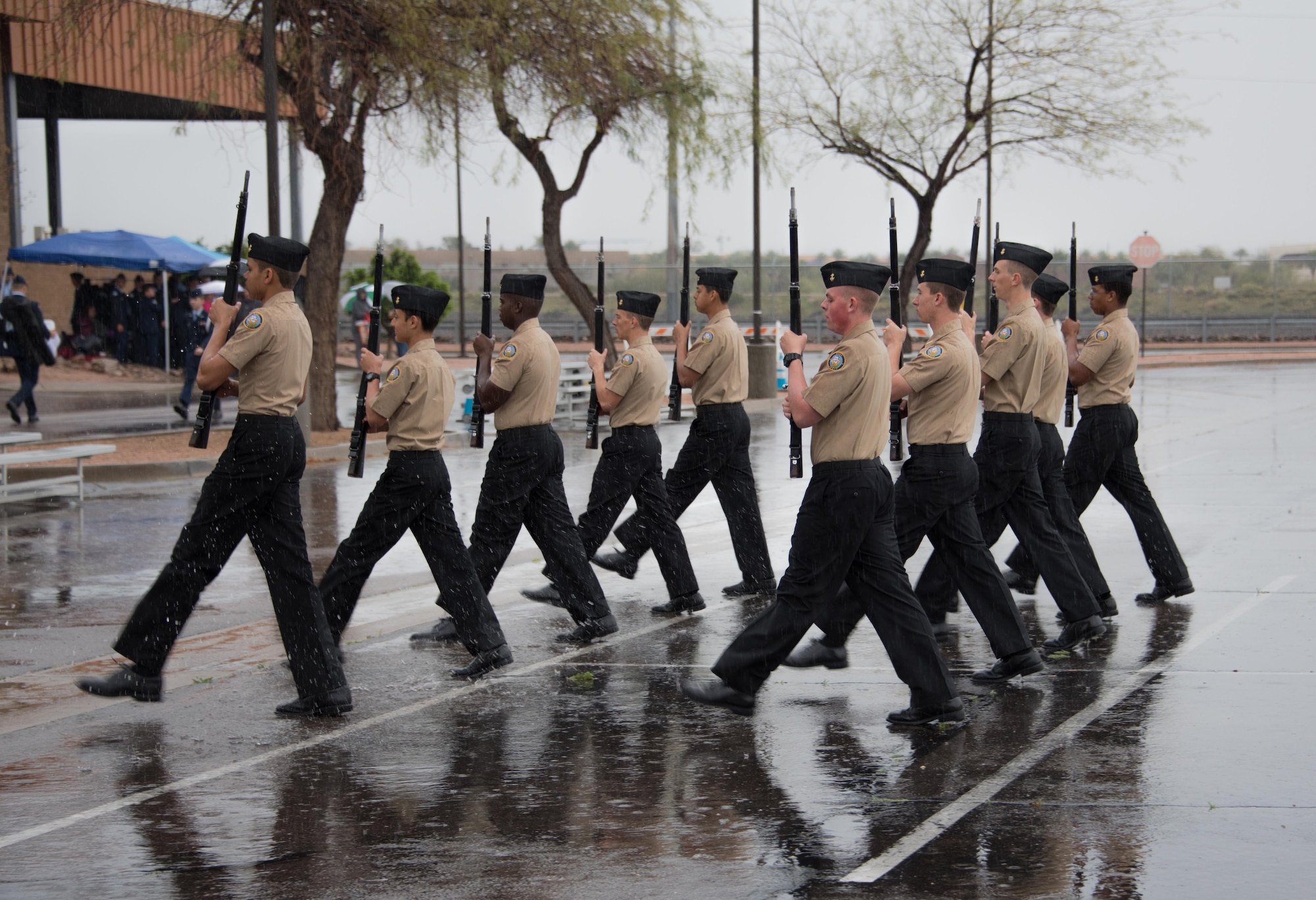 Members of the Thunderbird High School Junior Reserve Officer Training Corps armed drill team perform during the exhibition drill portion of the 18th Annual West-Mitchell drill meet at Goldwater Air National Guard Base, Feb. 18. More than 400 JROTC cadets, representing 20 high schools, competed in the drill meet hosted by the Arizona National Guard’s 161st Air Refueling Wing in Phoenix. The JROTC units competed in eight different drill categories, including inspection, armed and unarmed regulation, color guard, and armed and unarmed exhibition drills. (U.S. Air National Guard photo by Staff Sgt. Wesley Parrell)
