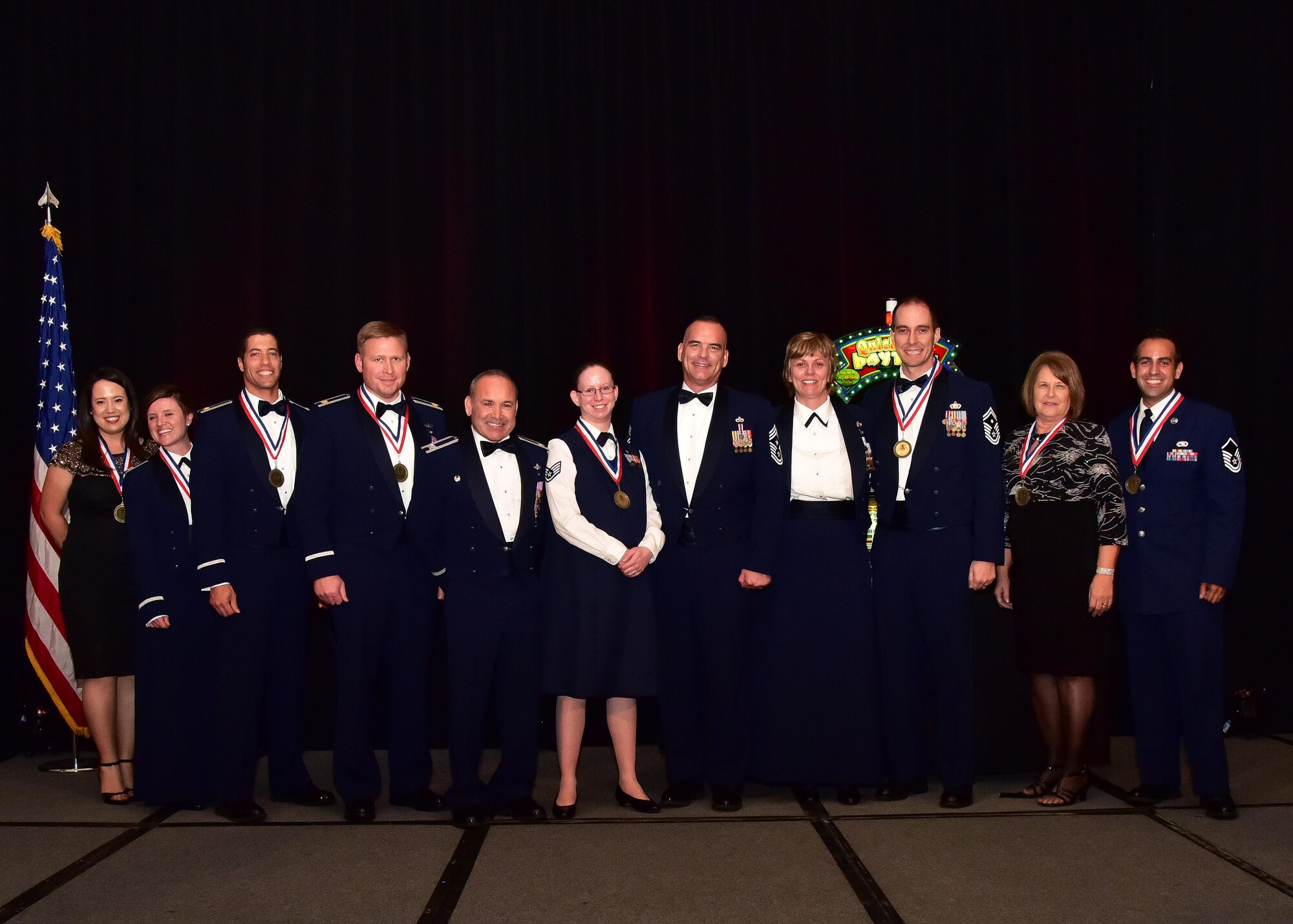 The 2016 944th Fighter Wing, Annual Award winners, pose for a photo Feb. 11 during their banquet at the Wigwam Resort in LITCHFIELD PARK, Ariz. (U.S. Air Force photo by Tech. Sgt. Louis Vega Jr.)