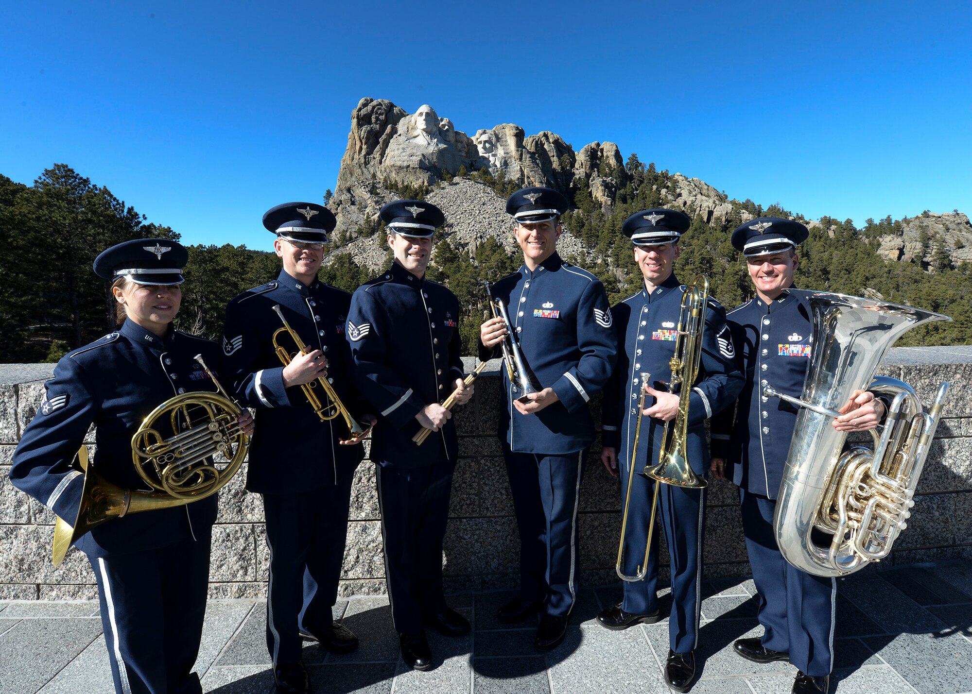 To celebrate President’s Day, Offutt Brass, the brass ensemble of the U.S. Air Force Heartland of America Band, performed at Mount Rushmore, S.D., Feb. 20, 2017. The audience was treated to music of patriotic fervor and had an opportunity to learn about the ensemble’s role within the Air Force. (U.S. Air Force photo by Senior Airman Anania Tekurio)