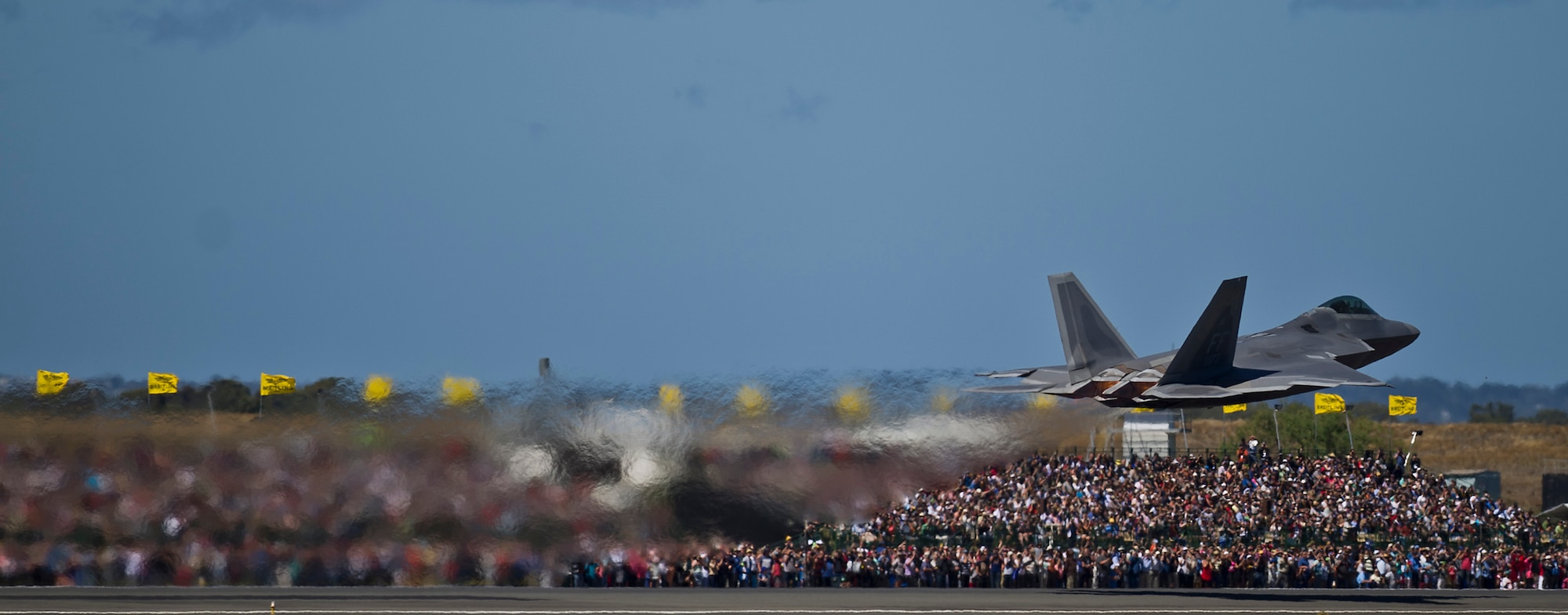 A U.S. Air Force F-22 Raptor from 94th Fighter Squadron Langley Air Force Base, Va., takes off to perform an aerial demonstration for an estimated 180,000 spectators at the Australian International Airshow, March 2, 2013, at Avalon Airport in Geelong, Australia. The Australian International Airshow 2013 (AIA13) is held biennially, and is one of the largest international trade shows in the Pacific. U.S. Pacific Command (USPACOM) participation in AIA13 directly supports theater engagement goals and objectives and further enhances relationships with other Pacific nations. (U.S. Air Force photo by Tech. Sgt. Michael R. Holzworth) 